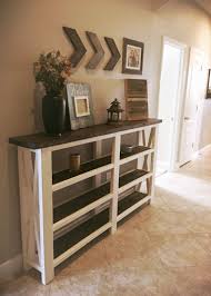 We build traditional values and contemporary rustic country décor charm into every piece… whatever your taste is, finish off that primitive furniture or rustic log furniture look with a barnwood wall table or rustic entry table that's built to last. Rustic Entry Table Rustic Decor Rustic Home Farmhouse Style Entry Table Farmhouse Decor Rustic Style Rust Home Decor Farm House Living Room Rustic House