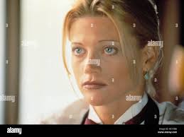 SWEEPER, THE, Janet Gunn, 1995 Stock Photo