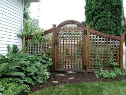 Good Neighbor Efi Arched Lattice Fence By Elyria Fence Garden Gate Design Garden Gates And Fencing Backyard Fences