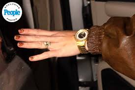 Taylor Swift Pairs $3K Leather Coat with Sparkling Engagement Ring for Night  Out (Exclusive)