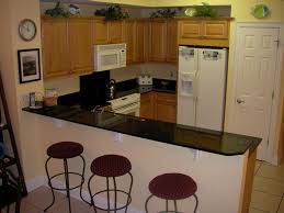 One thing small kitchen owners often overlook when organizing is vertical space. Small Kitchen Design With Bar Counter Novocom Top