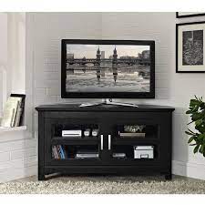 Metal hinges and corners accent beautifully with the manufactured wood, laminate construction. Overstock Com Online Shopping Bedding Furniture Electronics Jewelry Clothing More Corner Tv Stand Black Corner Tv Stand Corner Tv