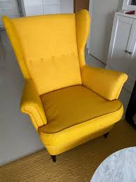 With a comfy sofa and armchair, you can get a comfy seat all to yourself and make room for others, too. Strandmon Yellow Chair Off 72