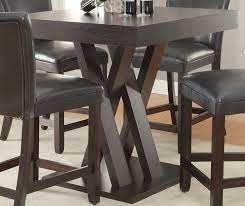 These types of dining sets have a more unique and casual look, while also offering extra leg room for guests and a great space for socializing. Mannes Cappuccino 5 Pcs Counter Height Table Set 100523