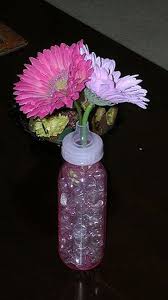 Celebrate In Style With These Perfect Baby Shower Ideas Baby Shower Centerpieces Baby Shower Gifts Baby Shower Table Centerpieces