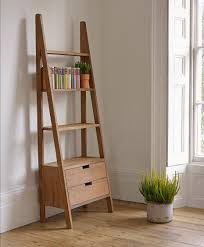 Natural Polished Teak Wood Rustic Wall Ladder Bookshelf Having Double Drawers Underneath In White Room Interio Easy Home Decor Bookcase With Drawers Home Decor