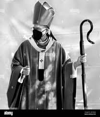 John Wester, the Archbishop of the Roman Catholic Diocese of Santa Fe in  New Mexico, wears a Covid face mask and carries a crozier, or staff Stock  Photo