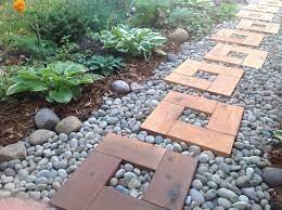 Stepping stones are necessary for being able to move throughout the garden without disrupting the soil, but they also create focal points and structure, and add a little bit of personality! Diy Garden Paths And Backyard Walkway Ideas The Garden Glove