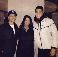 Following in his father's footsteps, devin booker has gained prominence as a basketball star. Devin Booker Parents