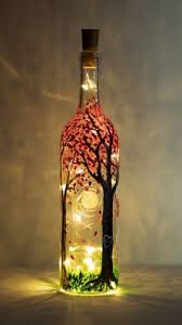 Hey Check Out Blossoming Forest Magic Wine Bottle With Fairy Lights At Silver Gulch Brewing And Bot Diy Bottle Crafts Glass Bottle Crafts Painted Wine Bottles
