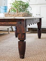 Remove the door, if it's still mounted to a frame, and refinish to enhance the natural wood or give it a fresh coat of paint.then attach it to a table framework. How To Make An Upcycled Coffee Table Hgtv