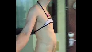 Femboy walking around motel in almost nothing - XNXX.COM