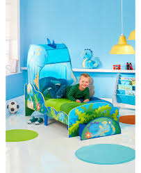 This dinosaur shaped cuddle pillow is 24lx7wx17.5h. Dinosaur Toddler Bed With Storage And Canopy