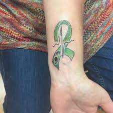 Mental health awareness ribbon tattoo. Photos At Living Art Tattoo Tattoo Parlor In Duluth