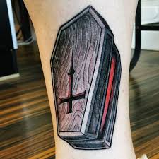 Doves are a part of christianity and represent peace. Old Style Colored Wooden Open Coffin With Inverted Cross Tattoo On Leg Tattooimages Biz
