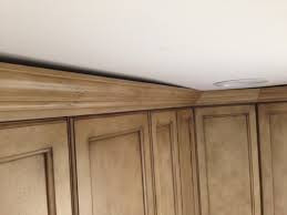 Measure the width of the forward or tall cabinet. How To Fix Gap Between Ceiling And Kitchen Crown Molding