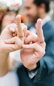 90 imaginative finger tattoos for the unashamed tattoo enthusiast. 60 Awesome Wedding Ring Tattoos Weddingomania