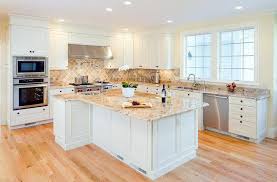 White Cabinet Granite Countertop Beige Tiled Backsplash Light Hardwood Floor Stainless Steel Appli White Granite Countertops Minimalist Kitchen Granite Kitchen