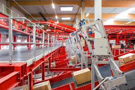 Scanner In A Dpd Parcel Sorting And Distribution Hub Estanteria