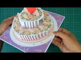 Or, you can make a wedding pop up card for that you can see how i pinch the tabs of the legs in the image below. Pop Up Wedding Cake Card Tutorial Youtube Wedding Cake Cards Cake Card Pop Up Cards