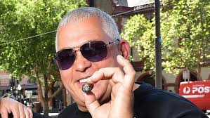 Mick Gatto's debt-collection agency sued over alleged failed debt  collection