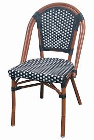 Brighten up the dining table with white chairs from crate and barrel. Parisian Rattan Bistro Black White Dining Chair