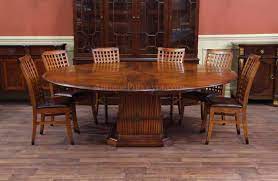 39 w colin dining table round marble stone top iron pedestal base modern. Solid Walnut Round Dining Table With Self Storing Leaves