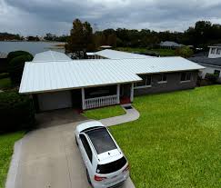 A solution is being applied to copper panels to accelerate patination (aging process for copper). The Pros And Cons Of Metal Roofs In Florida Janney Roofing