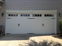 Steel Raised Panel Carriage House Garage Door With Windows And Decorative Handles Hinges