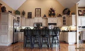 How To Paint Your Kitchen Cabinets Decorating Above Kitchen Cabinets Above Cabinet Decor Painting Cabinets