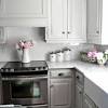 Light grey kitchen cabinets with black handles moderna stock quote. 1