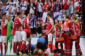 Christian eriksen of denmark goes down injured as teammates call for assistance during the uefa shocking scenes in denmark vs finals match, as christian eriksen suddenly collapses to the ground. Cuseixgpsrg91m