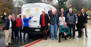 Good Neighbors by Faith Barnidge: Hats off to volunteering community