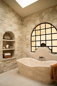 A seat with a generous view of the outdoors connects the room with nature and invites the user to stay awhile. 20 Enchanting Mediterranean Bathroom Designs You Must See Tuscan Bathroom Simple Bathroom Remodel Mediterranean Bathroom
