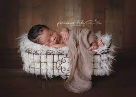 Gorgeous African American Baby Boy Sleeping On Fur In A Basket Newborn Precious B Newborn Baby Photography Baby Boy Newborn Pictures African American Baby Boy