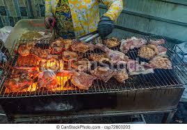 Maybe you would like to learn more about one of these? Woman Grilling Pork Chop And Ribs On Flaming Charcoal Stove Woman Grilling Bbq Pork Chop And Ribs On Flaming Charcoal Stove Canstock