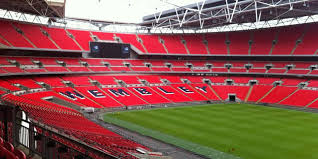 The most striking architectural feature is a giant arch that is the principal support of the roof. Wembley Stadium Sports And Events Guides Dfds