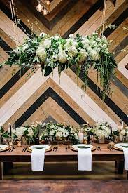 Urban Tropical Wedding Inspiration At A Brewery 100 Layer Cake Floral Wedding Decorations Tropical Wedding Inspiration Wedding Reception Head Table