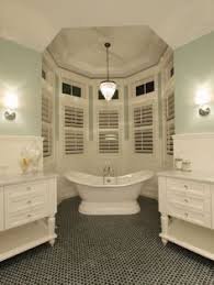 The Coved Ceiling In This Bathroom Frames The Bathtub And Allows For A Nice Separate Space To Relax The Whi Green Wall Color White Cabinetry Mint Green Walls