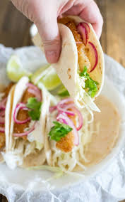 Maybe you would like to learn more about one of these? Crispy Fish Tacos With Brown Sugar Onions And Spiced Sour Cream Sprinkles And Sprouts