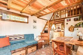 Tiny House With Upper Lounging Deck Outside Of Las Vegas Nevada Built And Shared By Rob Millar Of Old Tiny Houses For Rent Tiny House Living Tiny House Towns