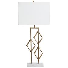 I have an elk lighting vanity light in my bathroom with delta champagne bronze. Ashley Signature Design Lamps Contemporary L208224 Edsel Champagne Metal Table Lamp With White Marble Base Dunk Bright Furniture Table Lamps