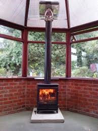 Fitting Wood Burning Stoves In A Conservatory Installing A Wood Burner If You Have No Chimney Best Wood Burning Stove Wood Burner Wood Burning Stove