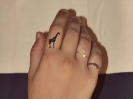 I Want A Real One But Behind My Neck Giraffe Tattoos Finger Tattoos Picture Tattoos