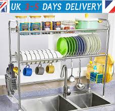 With its scrollwork details and slatted sides, this freestanding baker's rack is an elegant update of a classic design. Stainless Steel Kitchen Rack Sink Dish Drainer And Kitchen Utensils Storage Rack Kitchen Dining Bar Kitchen Storage Organization