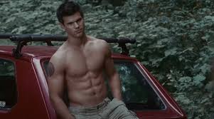 TAYLOR LAUTNER AS JACOB BLACK IN 'THE TWILIGHT SAGA' 😍 Here's one for Team  Jacob! 🖤 It's the year 2008, and Taylor Lautner as the cutest and hottest  werewolf ever appears on