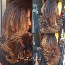 Medium layered haircut with curls 80 Cute Layered Hairstyles And Cuts For Long Hair In 2021