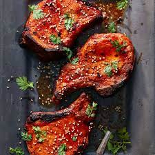 Spicy Pork Chops With Gochujang These Pork Chops Get A Spicy Kick From An Oj And Gochujang Marinade Pork Glaze Spicy Pork Pork Recipes