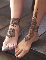 Man S And Woman S Leg Lightly Touching Henna Meaning Hers With Mandala And Ankle Bracelet Like Henna Tattoos Henna Leg Tattoo Foot Henna Henna Tattoo Foot