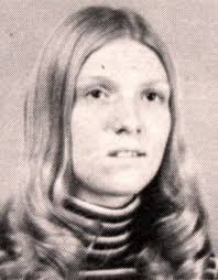 ASSISTS THE JOLLY ELF by Dave Millea Enterprise News (Cutline) BUSY WRITING  THOSE LETTERS